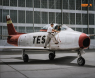 F-86A NACA135 on Ames ramp in front of hanger 211 with NACA pilots Cooper and Creer 150755-01.jpg